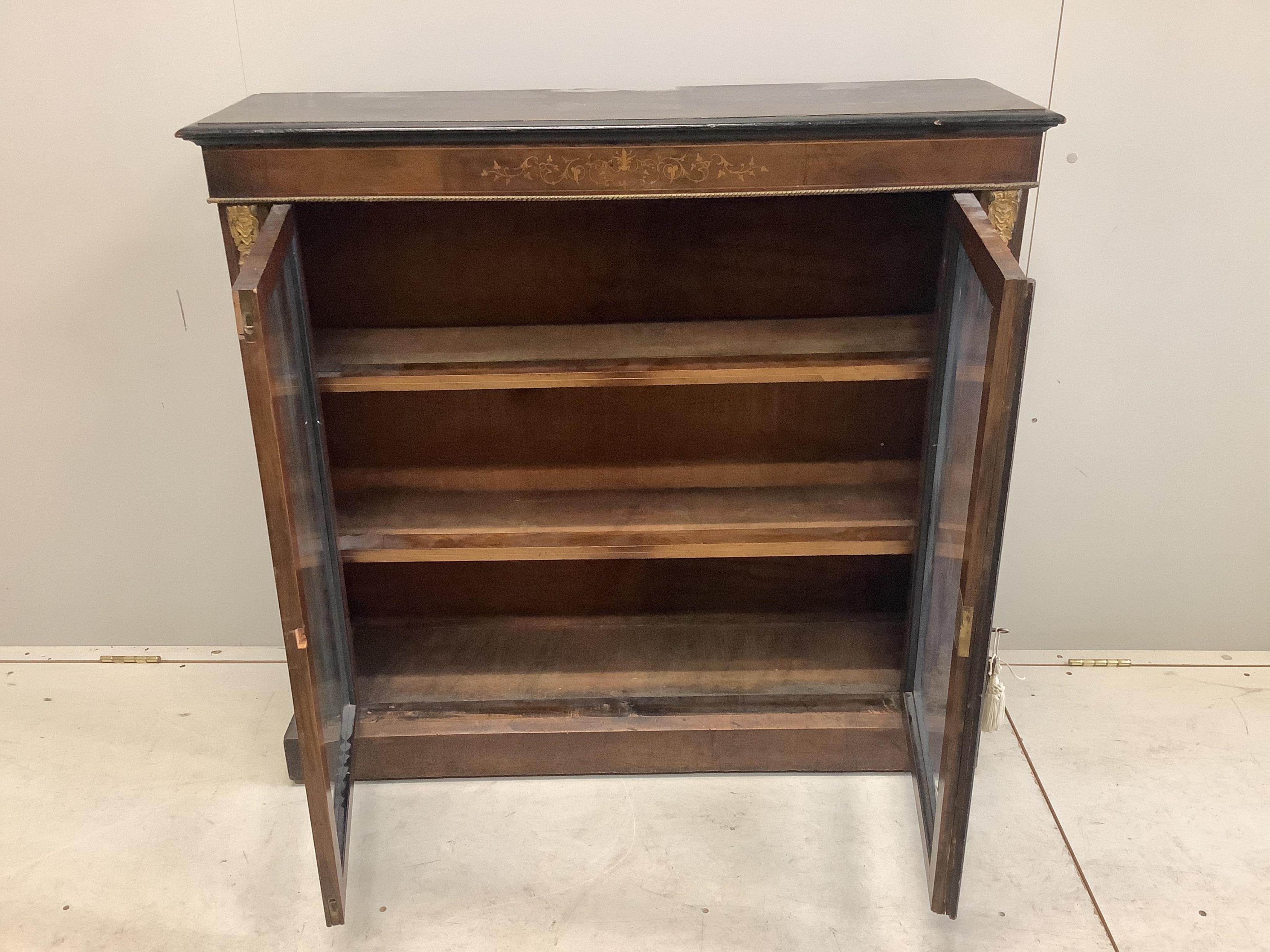 A mid Victorian gilt metal mounted inlaid walnut pier cabinet, width 107cm, depth 31cm, height 100cm. Condition - fair